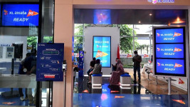 Strategi XL Axiata Bersaing dengan Telkomsel di Pasar FMC